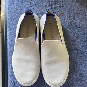 Rothy's women’s Cream Slip-On Loafers with Blue Trim
